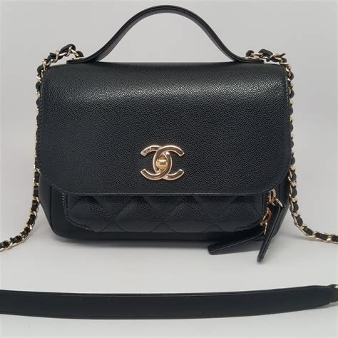 chanel flap bag blac|Chanel mini flap bag with top handle.